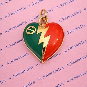 Authentic luxury zipper pull charm, from a genuine designer piece.